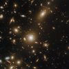 Телескоп Hubble сделал снимок массивного скопления галактик