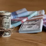 Нацбанк підвищив офіційний курс долара до гривні